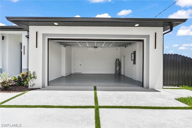 garage featuring electric water heater