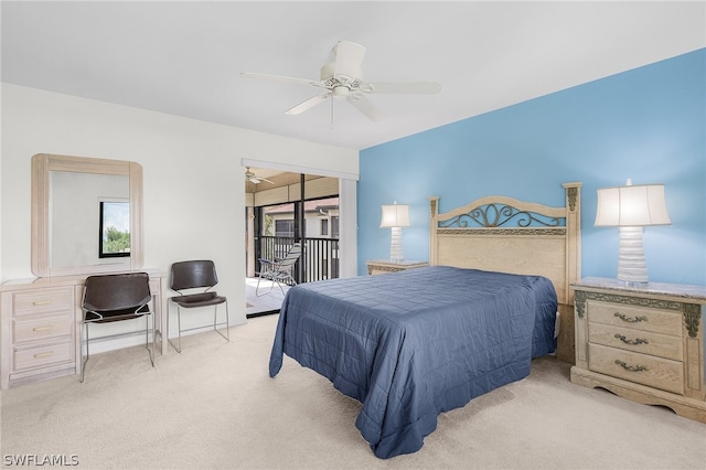 carpeted bedroom featuring access to outside and ceiling fan