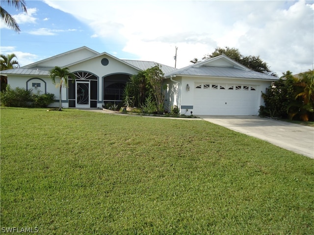 ranch-style home with a front yard and a garage