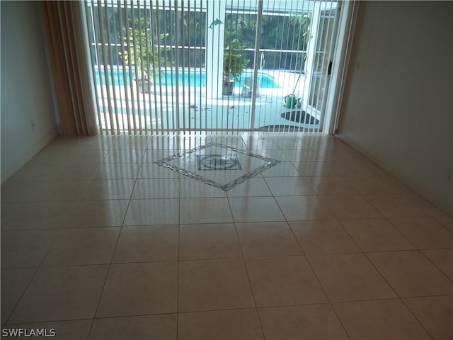 empty room featuring tile patterned floors