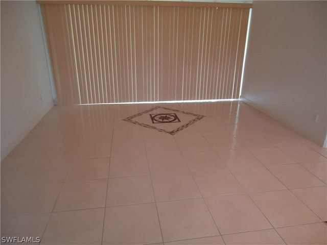 empty room featuring tile patterned flooring