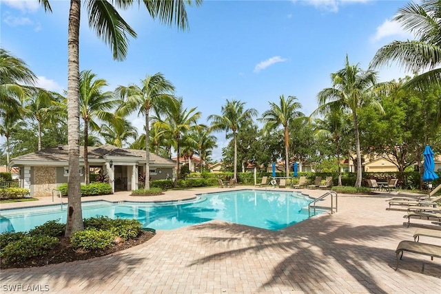 view of swimming pool with a patio area