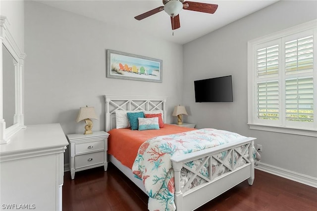 bedroom featuring ceiling fan and dark hardwood / wood-style floors