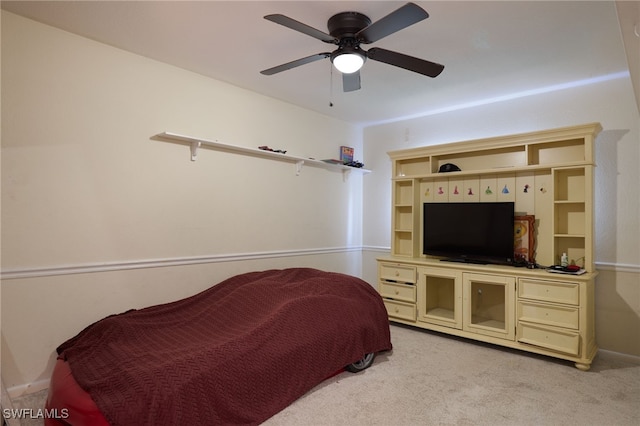 bedroom with light colored carpet and ceiling fan