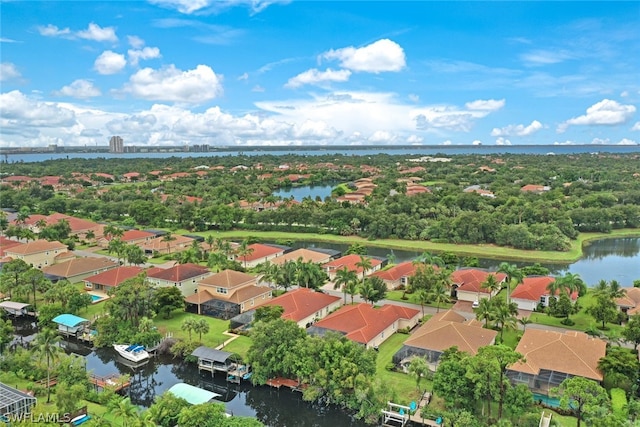 aerial view featuring a water view and a residential view