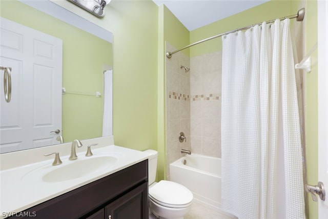 bathroom with shower / bathtub combination with curtain, toilet, and vanity