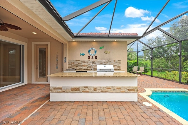 view of patio featuring an outdoor pool and area for grilling