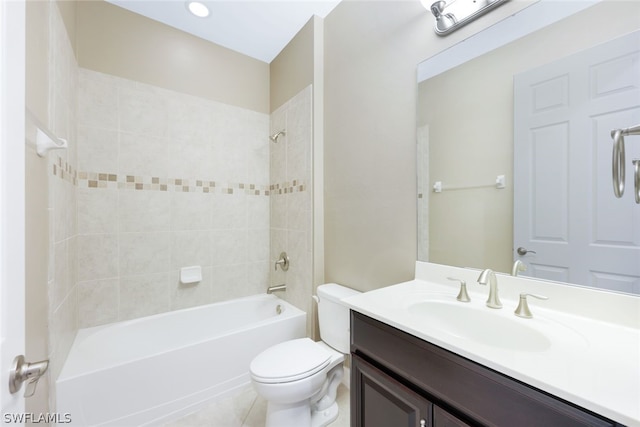 bathroom with toilet, tile patterned flooring,  shower combination, and vanity