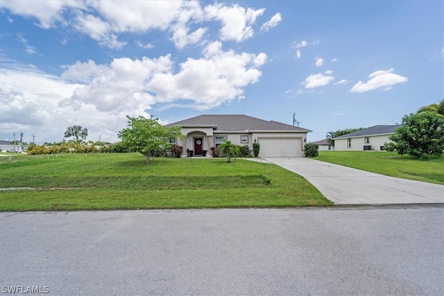 ranch-style home with a garage and a front lawn