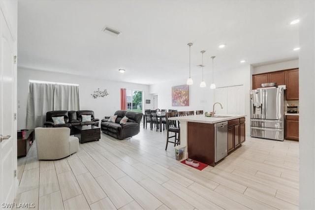 interior space featuring light hardwood / wood-style floors and sink