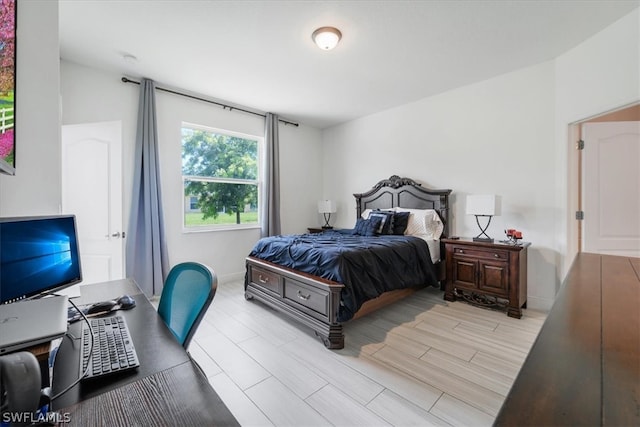 bedroom with light hardwood / wood-style floors