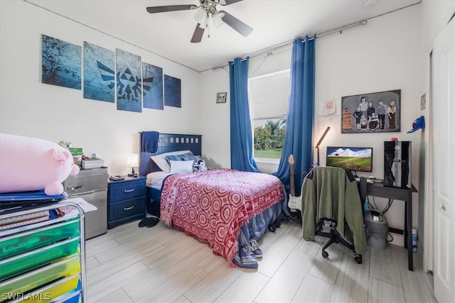 bedroom featuring ceiling fan and light hardwood / wood-style floors