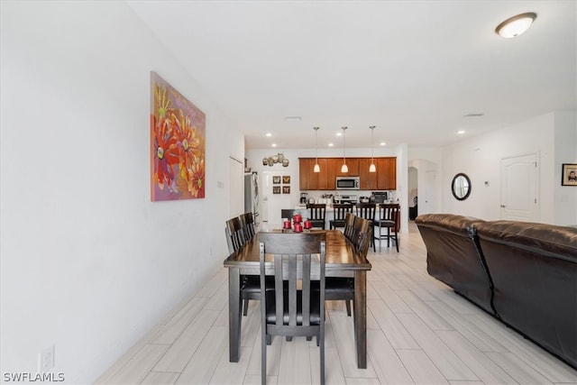 dining room featuring light hardwood / wood-style flooring