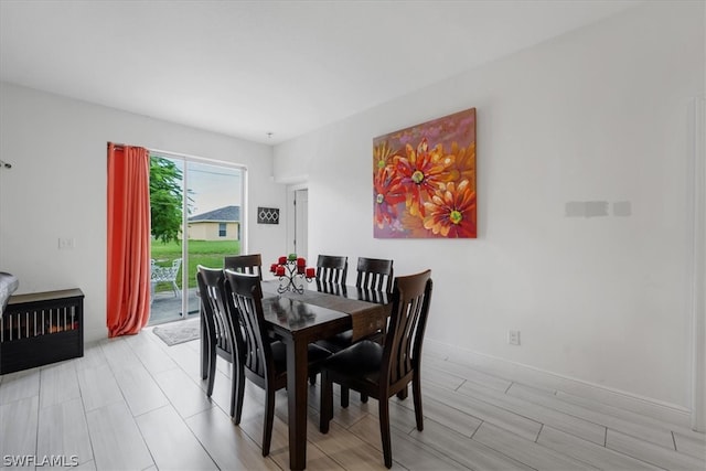 dining space featuring light hardwood / wood-style floors