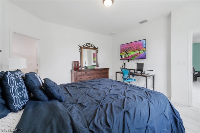 bedroom featuring light hardwood / wood-style floors