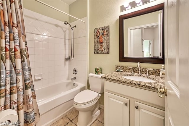 full bathroom with tile patterned floors, toilet, vanity, and shower / bath combo