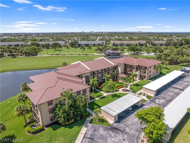 bird's eye view with a water view