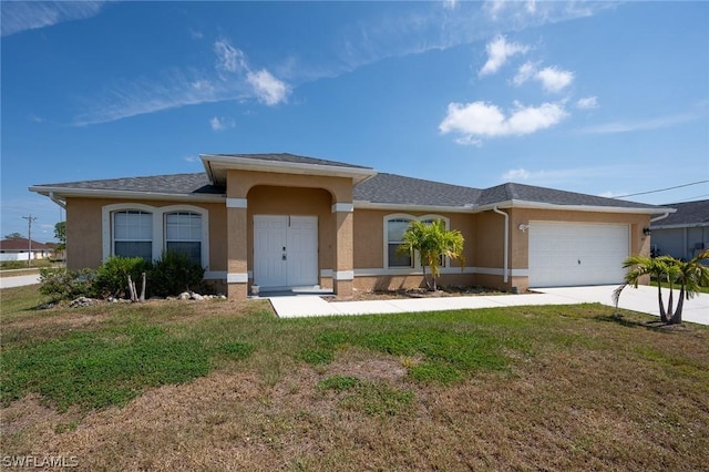 single story home with a front lawn and a garage