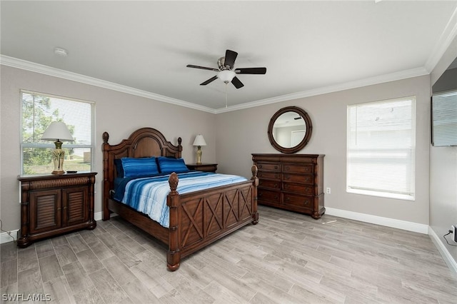 bedroom with ceiling fan, crown molding, and light hardwood / wood-style flooring