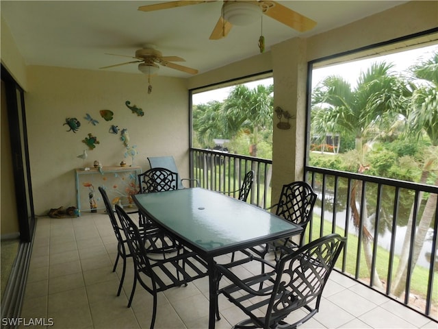 sunroom / solarium with ceiling fan