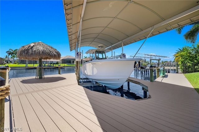 dock area with a water view