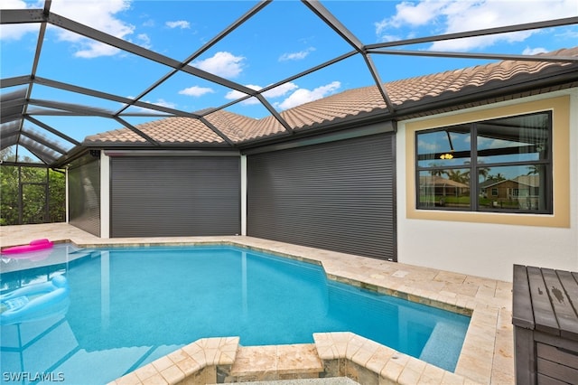 view of swimming pool with glass enclosure