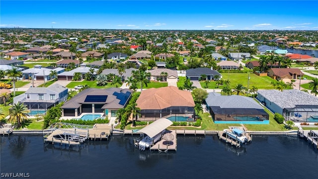 bird's eye view with a water view