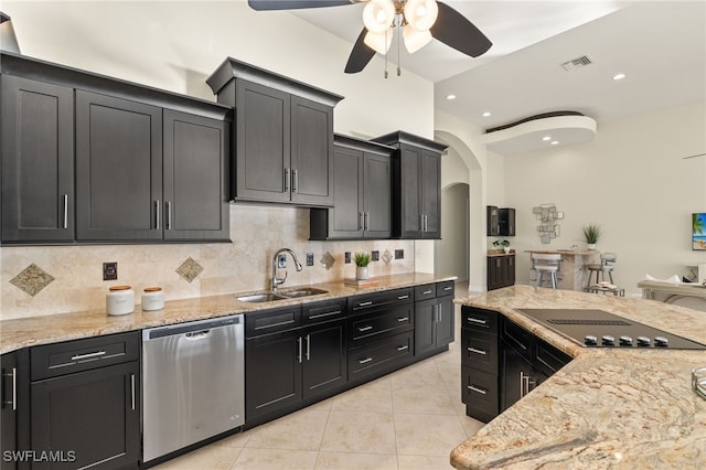 kitchen with sink, dishwasher, light stone counters, black electric stovetop, and decorative backsplash