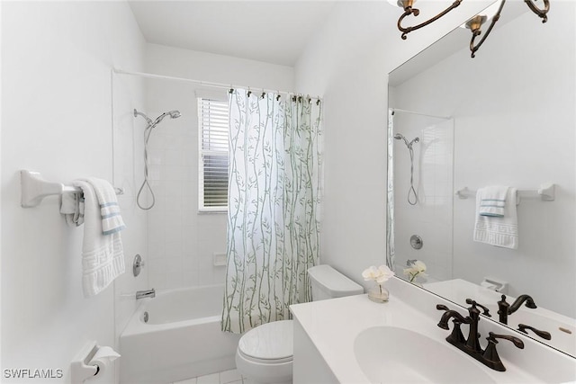full bathroom with toilet, vanity, and shower / bath combo
