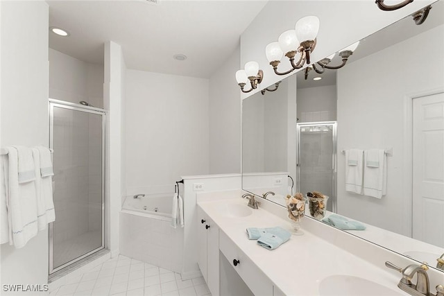 full bath with a shower stall, tile patterned floors, and a sink