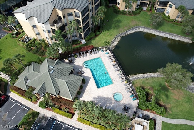 bird's eye view with a water view