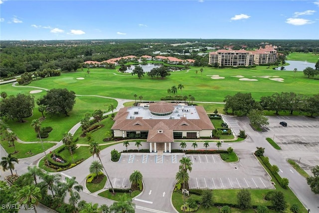 aerial view featuring a water view and golf course view