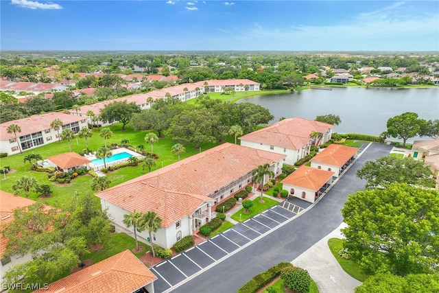 drone / aerial view with a water view