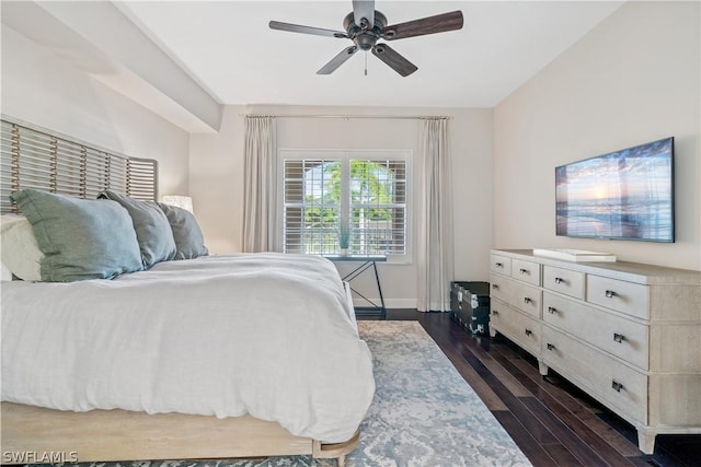 bedroom featuring dark hardwood / wood-style flooring and ceiling fan