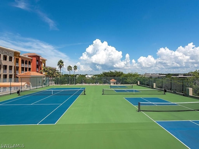 view of sport court featuring basketball hoop