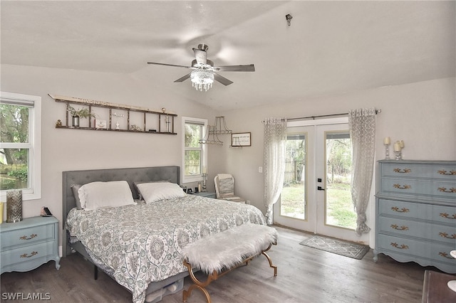 bedroom featuring vaulted ceiling, wood-type flooring, french doors, and access to exterior