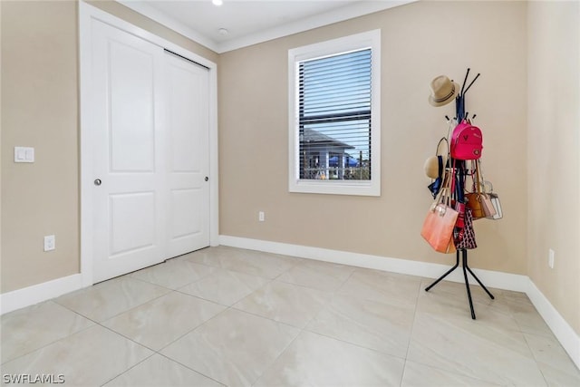 unfurnished bedroom featuring a closet and light tile patterned floors