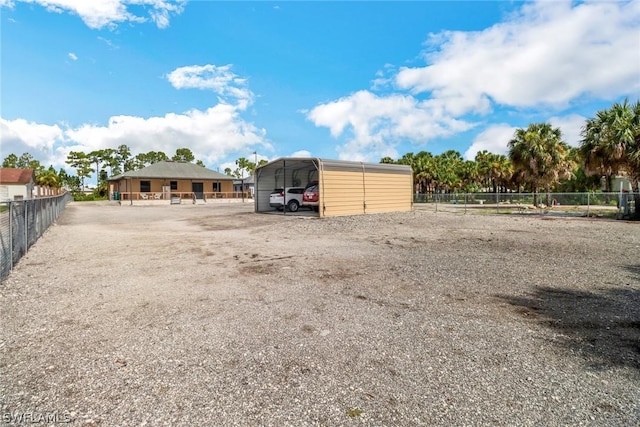 exterior space featuring a carport