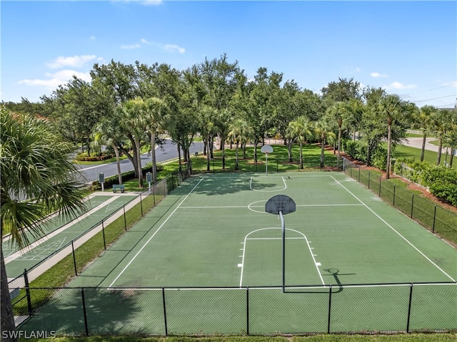 exterior space featuring basketball hoop