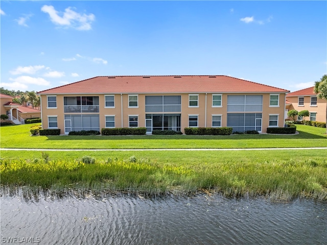 exterior space with a water view