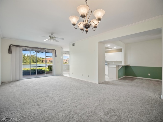 unfurnished living room with light colored carpet, a water view, ceiling fan with notable chandelier, and crown molding