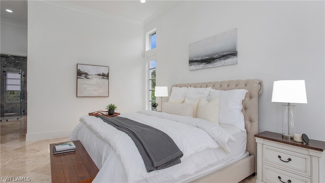 bedroom with crown molding