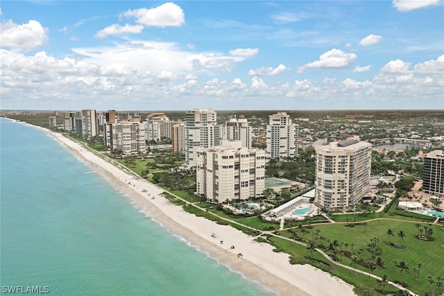 aerial view with a view of the beach and a water view