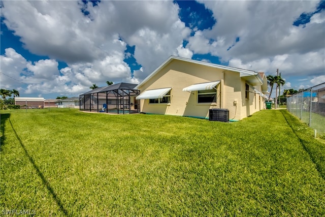 view of yard featuring central AC unit