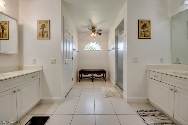 bathroom featuring vanity, ceiling fan, and tile patterned floors