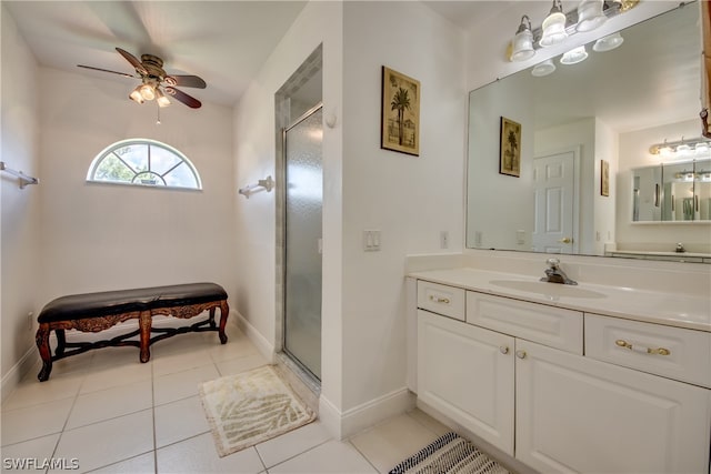 bathroom with vanity, an enclosed shower, tile patterned flooring, and ceiling fan