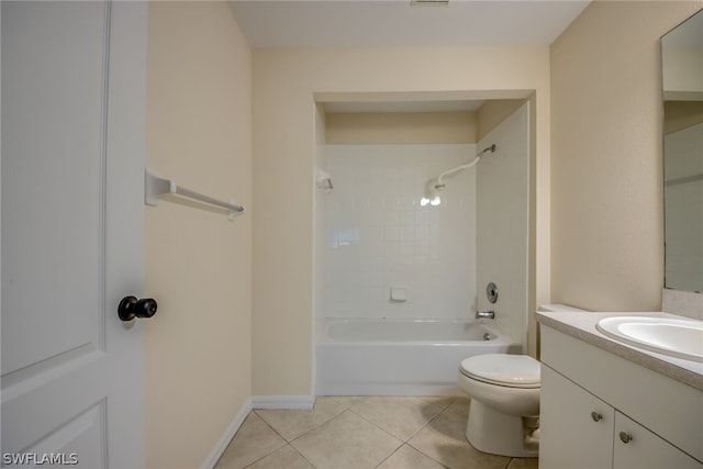 full bathroom featuring toilet, tiled shower / bath, tile patterned floors, and vanity