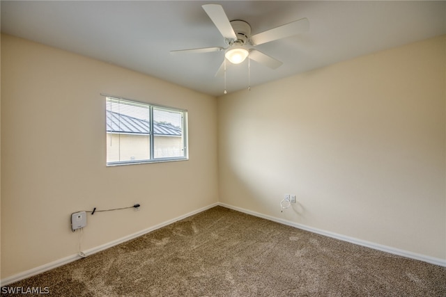 carpeted empty room with ceiling fan