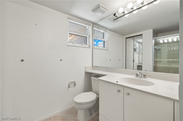 bathroom with walk in shower, vanity, toilet, and tile patterned flooring