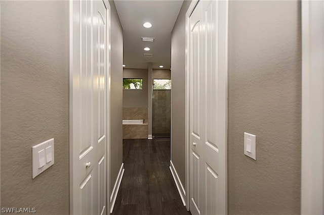 hall featuring dark hardwood / wood-style flooring